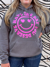 Load image into Gallery viewer, HAVE THE DAY YOU DESERVE SMILEY FACE: charcoal gray hoodie with hot pink graphic
