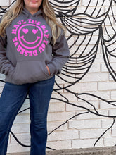 Load image into Gallery viewer, HAVE THE DAY YOU DESERVE SMILEY FACE: charcoal gray hoodie with hot pink graphic
